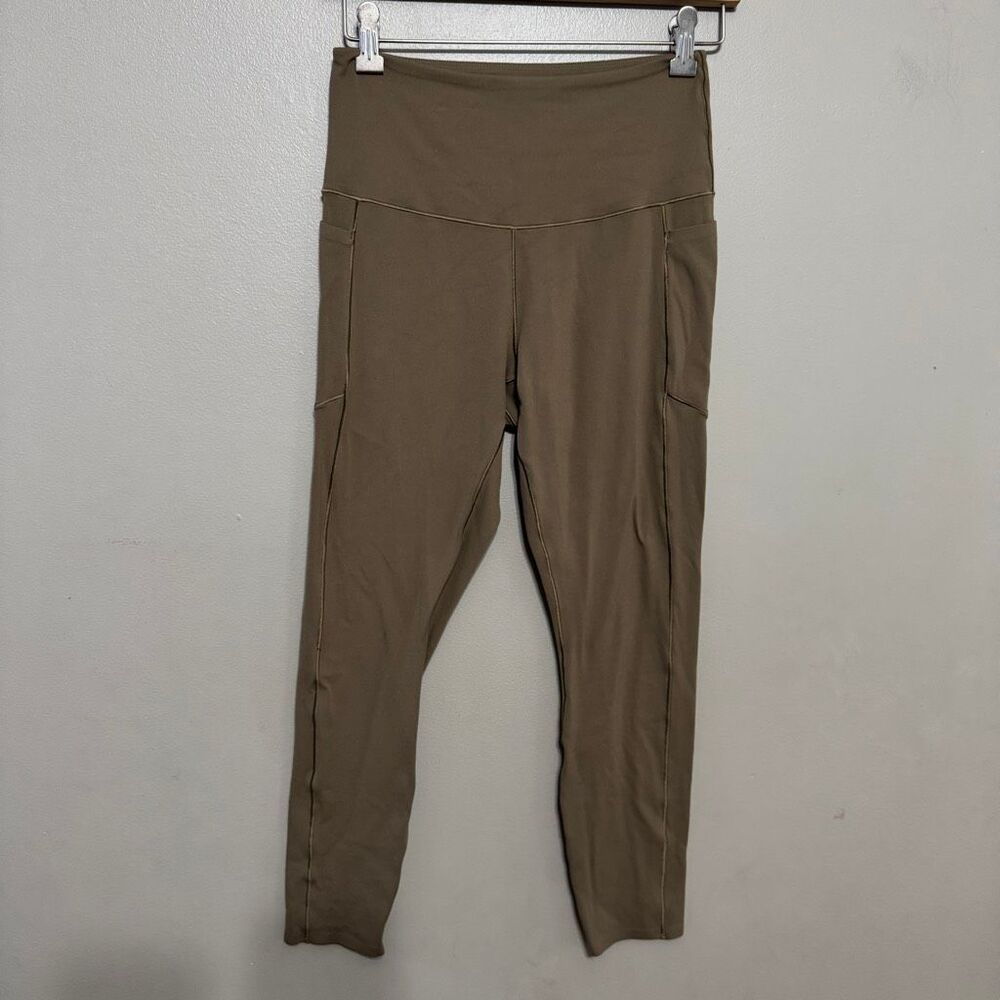 Rhône olive tan side pocket women’s leggings size medium